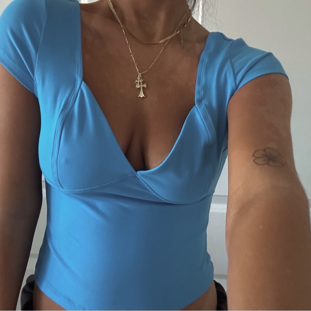 bright blue top